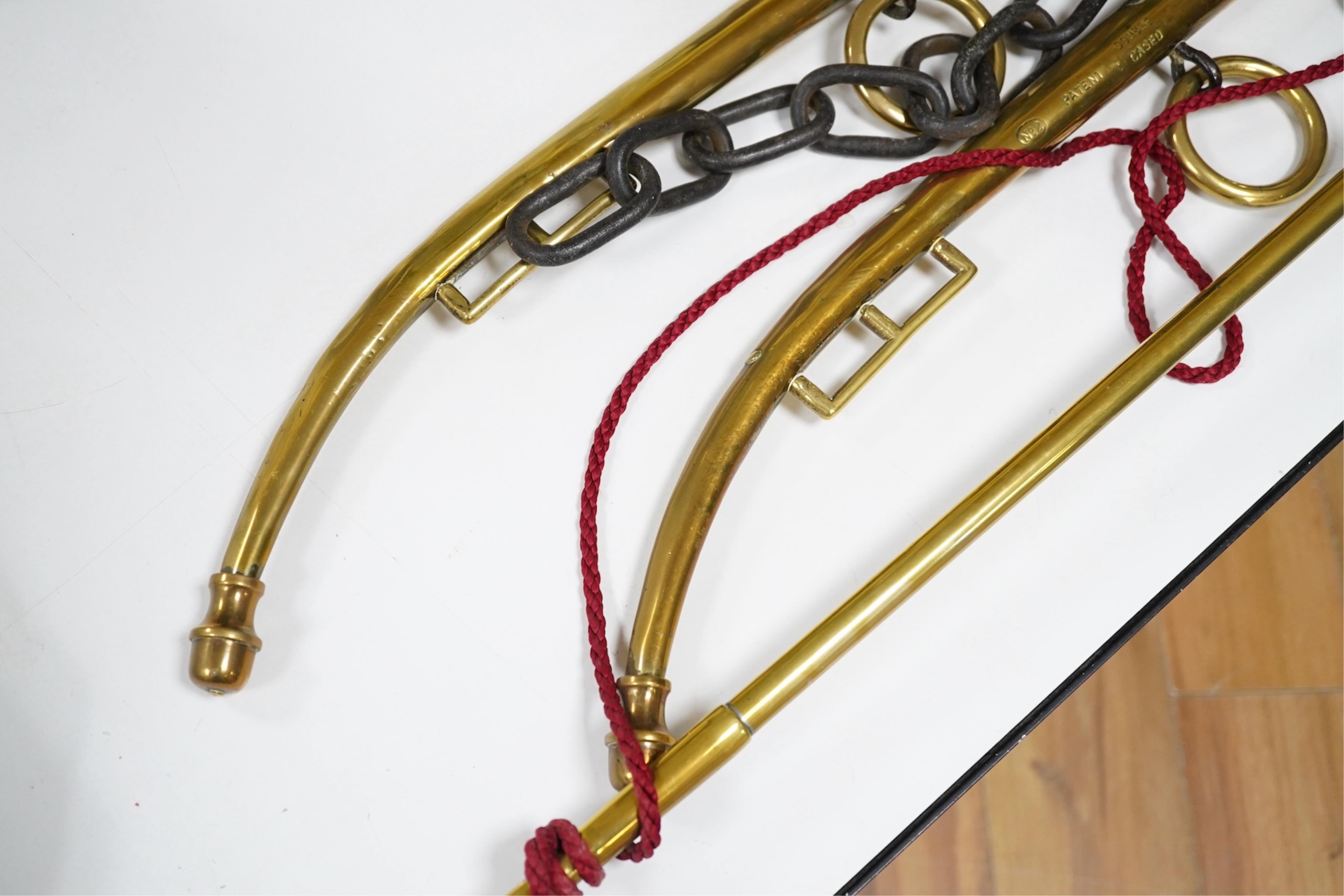 A pair of brass horses hames and a copper hunting horn (3)